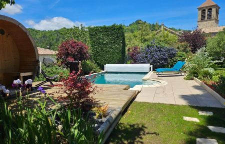 G&icirc;te n&deg;141700 Lentill&egrave;res - Ard&egrave;che - La piscine, le sauna et la vue sur l'&eacute;glise